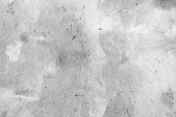 Texture of a concrete wall with cracks and scratches which can be used as a background