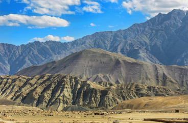 Fototapeta na wymiar View of dry mountain range of Himalayas in Ladakh, India