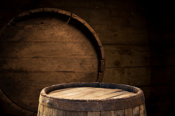 Old wooden barrel on a brown background