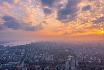 Naklejka na ściany i meble Aerial view of old city at sunrise