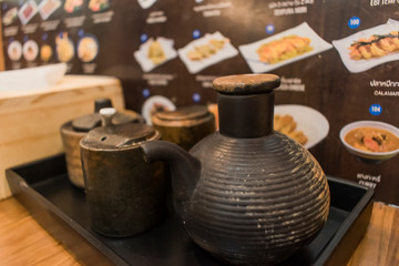 Fototapeta na wymiar Japanese condiment set. Set on the table in a Japanese restaurant.