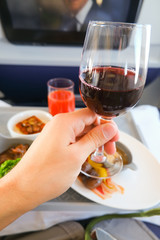 photo of Food served on board of business class airplane on the table