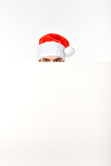 Santa man in christmas red hat for new year holiday with white paper sheet isolated on white background, copy space