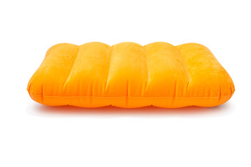 Orange inflatable pillow isolated on a white background with clipping path. Decoration design, Holidays concept.
