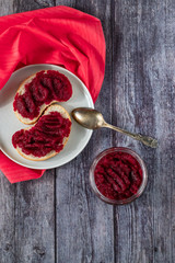 Sandwiches with natural homemade beetroot jam, with vanilla and sugar. Healthy food, vegetarianism.