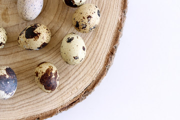 Isolated quail eggs on white background. Food concept.Quail eggs are smaller than chicken, yet they...