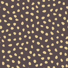 Seamless background with random elements. Abstract brown and golden ornament. Dotted abstract pattern