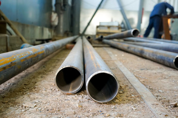 Many Pipes with prepared edges for electric arc welding at a refinery