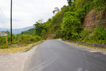 Fototapeta premium Mountain road curve on the way to Khamkert lak20, borikhamxay Province, Laos