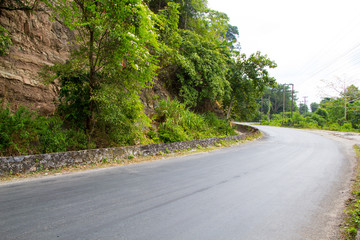 Fototapeta na wymiar Mountain road curve on the way to Khamkert lak20, borikhamxay Province, Laos
