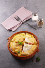 tartiflette, french dish with potato, bacon and cheese