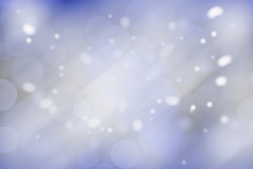 Blue abstract texture background with light bokeh stars blurred for Christmas new year