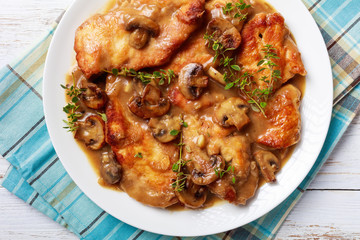 rustic style of Chicken Marsala on a plate