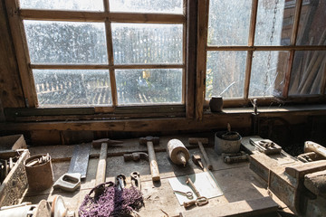 in an old barn there are nets, baskets, tools