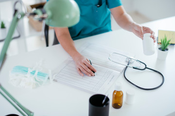 Top view of female doctor giving medicals.