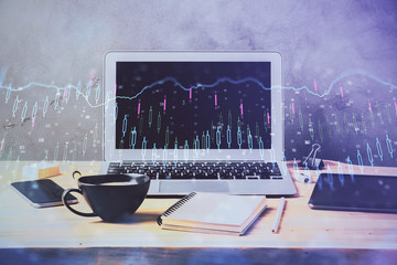 Double exposure of graph and financial info and work space with computer background. Concept of...