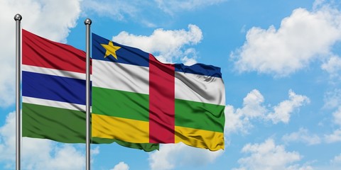Gambia and Central African Republic flag waving in the wind against white cloudy blue sky together. Diplomacy concept, international relations.