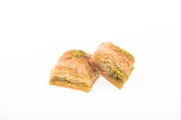 traditional turkish honey baklava with nuts isolated on white