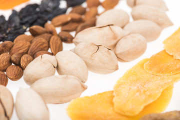 assorted turkish dried fruits and nuts isolated on white