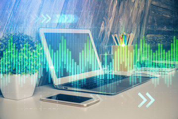 Multi exposure of forex graph and work space with computer. Concept of international online trading.