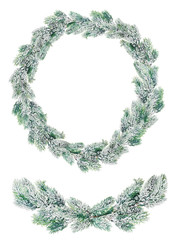 green Christmas wreath in snow isolated on white