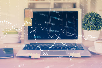 Technology theme drawing and table with computer. Double exposure. Concept of information.