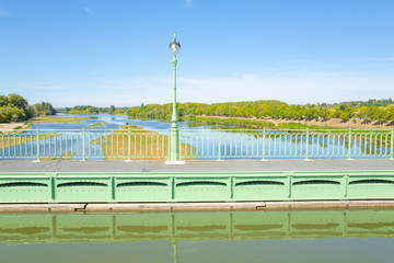 Naklejka premium The historic Pont de Briare in over the river Loire in Centre-Val de Loire, France