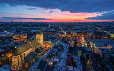 Obraz premium Aerial panoramic view of historical city center at twilight, Lviv, Ukraine. UNESCO world heritage site