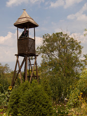 Historical reconstruction of the Cossack farm. Watchtower with a dummy sentinel Cossack.  