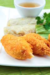 crab claw donuts and spring rolls