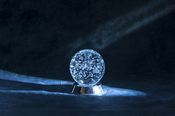 blue magic glass ball with mystical light
