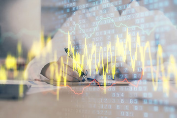 Financial chart drawn over hands taking notes background. Concept of research. Multi exposure