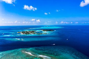 Aerial view, Maldives island Kandooma and Guraidhoo lagoon, South Male Atoll, Maldives