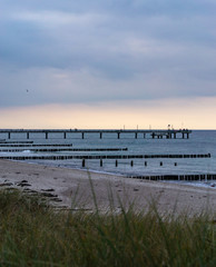 Fototapeta na wymiar sunset at the pier in Heiligendamm