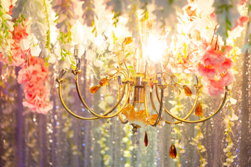 Hand made paper flower and decorative lighting, Wedding decoration stage in Bangladesh.