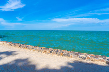 Beautiful umbrella and chair around beach sea ocean with blue sky for travel