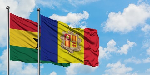Ghana and Andorra flag waving in the wind against white cloudy blue sky together. Diplomacy concept, international relations.