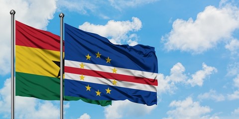 Ghana and Cape Verde flag waving in the wind against white cloudy blue sky together. Diplomacy concept, international relations.