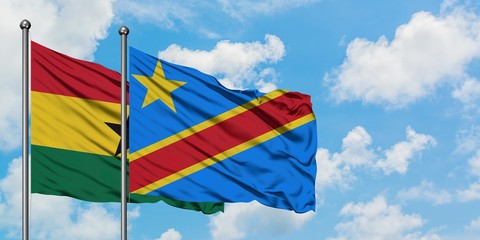 Ghana and Congo flag waving in the wind against white cloudy blue sky together. Diplomacy concept, international relations.