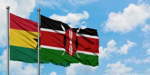 Ghana and Kenya flag waving in the wind against white cloudy blue sky together. Diplomacy concept, international relations.