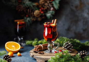Christmas mulled red wine with spices, cranberry and fruits. Traditional Christmas hot drink....