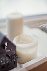 lantern house with candle and cotton flower