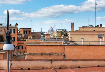 Fototapeta premium Rome rooftop city view and dome St. Peter's cathedral. Italy