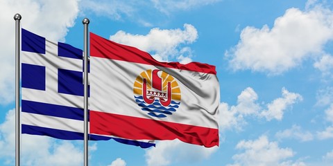 Greece and French Polynesia flag waving in the wind against white cloudy blue sky together. Diplomacy concept, international relations.