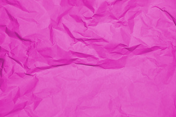 Fototapeta premium Crumpled recycle pink paper background - Pink paper crumpled texture - Pink paper wrinkled background.