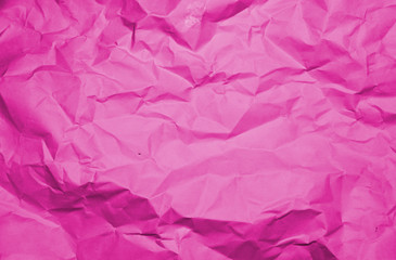 Crumpled recycle pink paper background - Pink paper crumpled texture - Pink paper wrinkled background.