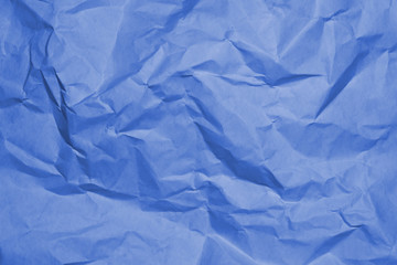 Blue crumpled paper texture background.
