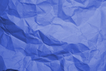 Fototapeta premium Blue crumpled paper texture background.