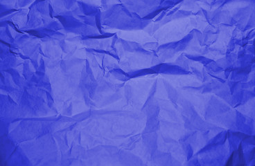 Blue crumpled paper texture background.