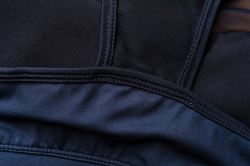 Close-up fragment of black nylon garment